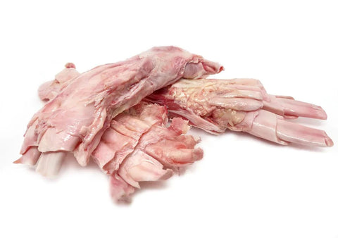 Raw beef tendon 2lbs pile showing texture and collagen-rich meat cut for cooking and stews