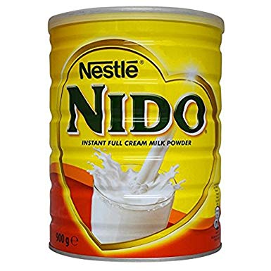 Nestle Nido Milk 900g instant full cream milk powder container with splash of milk on yellow packaging