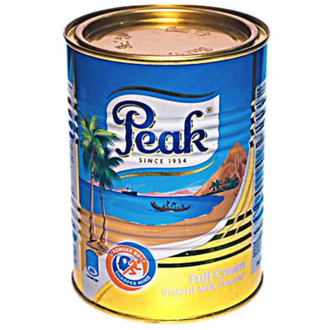 Peak Full Cream Milk 900g can of instant milk powder with tropical beach design