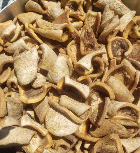 Dried white beef hide dog chews in a pack of 10 pieces for dental health and chewing satisfaction