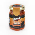 Jar of Foronto Hot Pepper and Mango Sauce with vibrant chili and mango ingredients