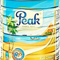 Peak Full Cream Instant Milk 2500g tin with tropical beach design and rich creamy milk powder label