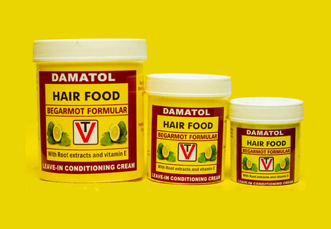 Damatol Hair Food leave-in conditioning cream containers with bergamot formula and vitamin E.