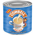 EXP Cowbell Milk Evaporated 150g can with creamy milk pouring into a cup, enriched with vitamins A, C, D, E, and K for cooking and baking.