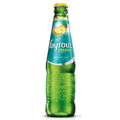 Fayrouz Pineapple Glass Bottle with sparkling beverage.