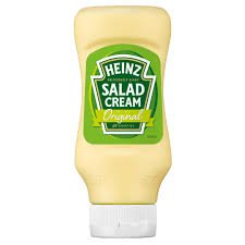 Heinz Salad Cream 605g bottle with classic green label and creamy texture.