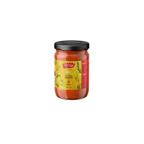 Jar of Jiffy Jollof Sauce made from tomatoes, bell peppers, and spices for authentic West African Jollof rice.