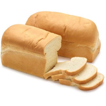 Agege Bread loaves with sliced pieces showing spongy texture.