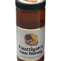 Fauzziyah's Raw Sasun Refined African Honey Honey 600g jar with rich golden color.