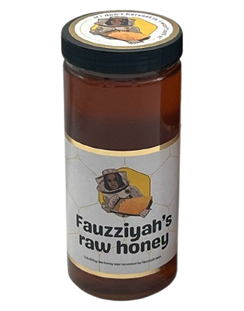 Fauzziyah's Raw Sasun Refined African Honey Honey 600g jar with rich golden color.